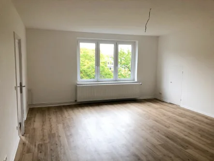 Wohnzimmer - Wohnung mieten in Hannover - KUNZE: Ihr neues Zuhause in der Nordstadt