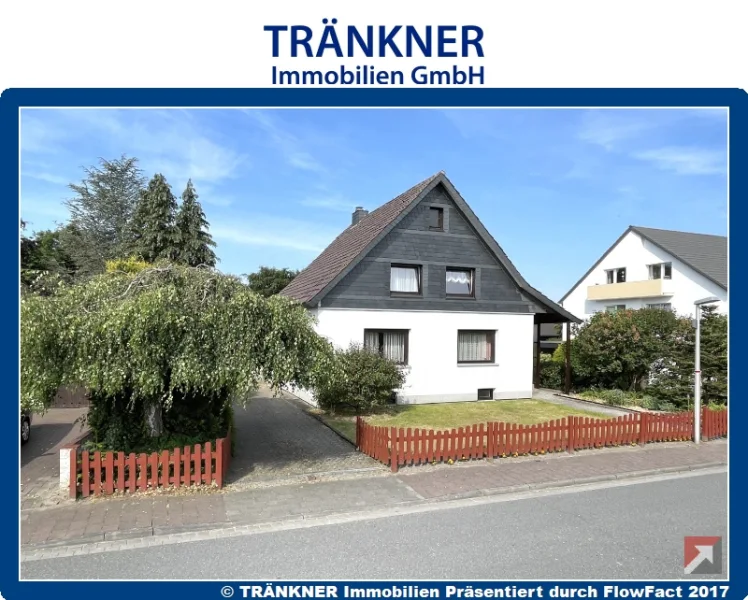 Ansicht - Haus kaufen in Langen - Charmantes Siedlungshaus in Langen