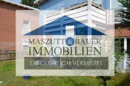 Gartenansicht - Wohnung mieten in Adendorf - VERMIETET - Freundliche 3-Zimmer-Wohnung mit Terrasse und kleinem Garten