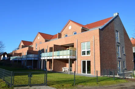 Außenansicht - Wohnung mieten in Adendorf - Charmante 3-Zimmer-Wohnung mit kleinem Garten