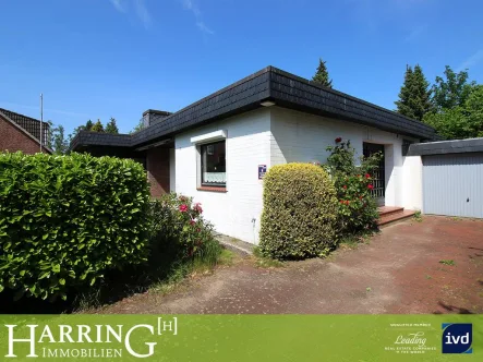 Titelbild  - Haus kaufen in Ahrensburg - Großzügiger Bungalow auf familienfreundlichem Grundstück