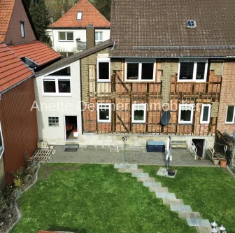 Außenansicht vom Garten  - Haus kaufen in Delligsen - Familienglück im charmanten Fachwerkhaus oder als Kapitalanlage!?