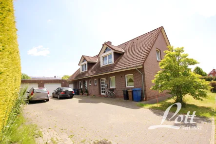 7717n-06 - Haus kaufen in Westerstede / Ocholt - +++ Vermietetes Doppelhaus mit zwei Garagen - Nähe Bahnhof! +++