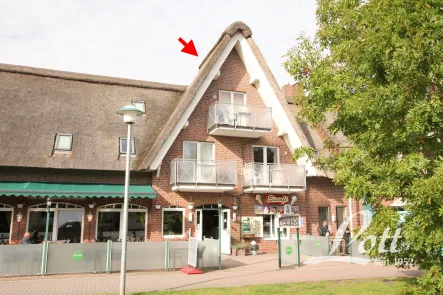 Straßenansicht - Wohnung kaufen in Butjadingen / Burhave - +++Nordsee-Liebhaber aufgepasst! Gemütliche Wohnung unter Reet in toller Lage in Burhave+++