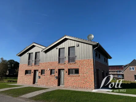 Außenansicht - Haus mieten in Apen / Augustfehn - **Neubau-Doppelhaushälfte mit Carport in toller Wohngebietslage**