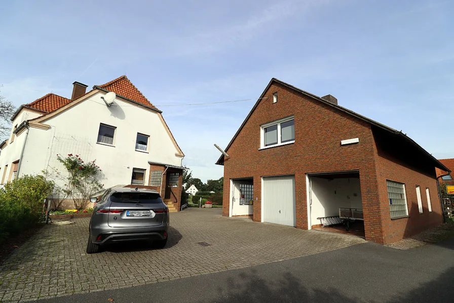 Bild1 - Haus kaufen in Bissendorf-Wersche - Einfamilienhaus m. Nebengebäude (ggf. zu einer Wohnung ausbaubar) in ländlicher Lage