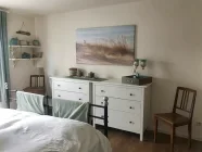 Schlafzimmer mit Zugang zum Balkon