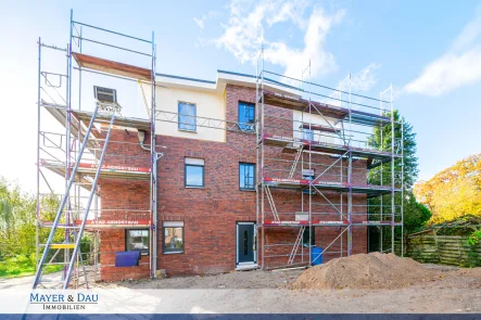 Außenansicht - Wohnung mieten in Bad Zwischenahn / Rostrup - Bad Zwischenahn: Erdgeschoss Neubauwohnung nach KfW 40 Standard, Obj. 8208