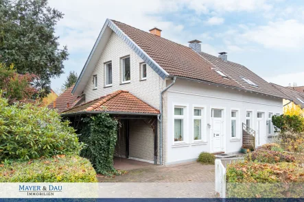 Titelbild 2 - Haus kaufen in Oldenburg - Oldenburg: Charmante Doppelhaushälfte mit großzügigem Garten, Wintergarten und Kamin Obj. 8183