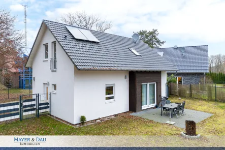 Titelbild - Haus kaufen in Hatten - Kirchhatten: Modernes Einfamilienhaus mit großzügigem Garten, Obj. 8296