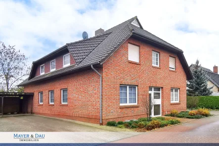 Außenansicht - Wohnung kaufen in Stadland - Stadland: Tolle Eigentumswohnung mit Balkon in Kleinsiel, Obj. 8282