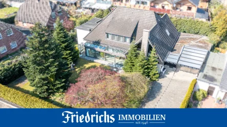  - Haus kaufen in Rastede / Wahnbek - Großzügiges Wohnhaus mit Wohnwintergarten, Garage und Wohnmobilcarport in Rastede-Wahnbek