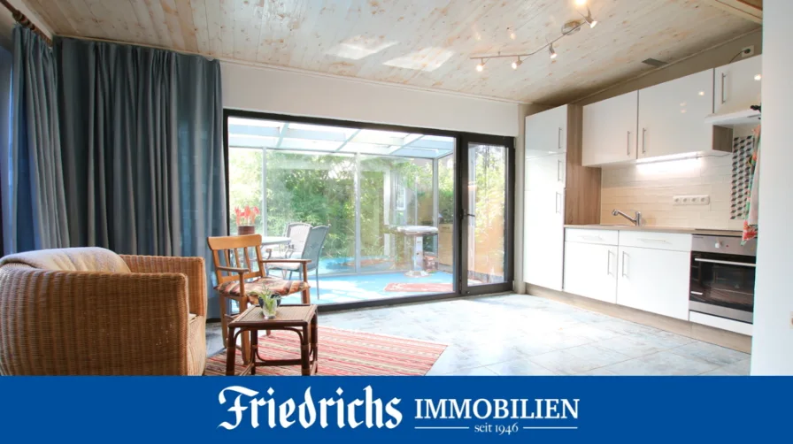  - Haus kaufen in Westerstede - Charmantes Wochenendhaus mit Wintergarten und Carport in idyllischer Lage in Westerstede-Karlshof