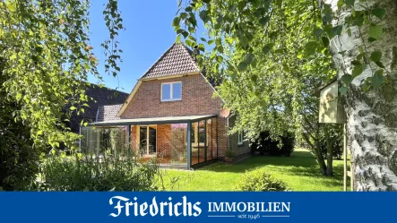  - Haus kaufen in Bad Zwischenahn - Einfamilienhaus mit 2 Carports, Sommergarten, Terrasse u. Teilkeller in Bad Zwischenahn-Ekern