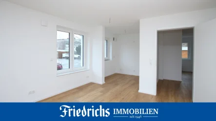  - Wohnung kaufen in Varel - Stilvolle 3-Zimmer-Neubau-Wohnung im EG mit Terrasse in zentraler Lage von Varel nahe Dangast