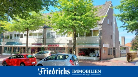 Titel-Friedrichs - Haus kaufen in Bad Zwischenahn - Wohn- und Geschäftshaus mit Nebengebäude und zwei Garagen im Zentrum von Bad Zwischenhahn