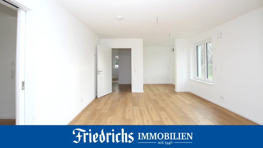  - Wohnung kaufen in Varel - Stilvolle 3-Zimmer-Neubau-Wohnung im EG mit Terrasse in zentraler Lage von Varel nahe Dangast