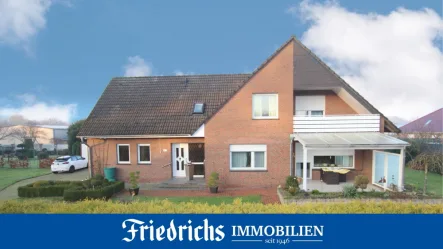  - Haus kaufen in Friesoythe - Geräumiges Einfamilienhaus auf großem Grundstück mit Terrasse, Balkon, Garage, Keller in Friesoythe