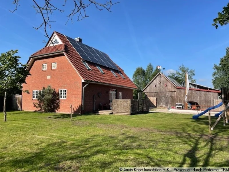 Ansicht - Haus kaufen in Elsfleth - Wohnhaus mit Nebengebäuden und großem Grundstück in ländlicher Lage, Moorriem/ Oldenburger Stadtnähe