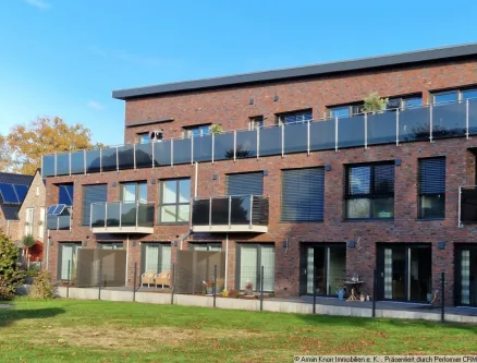 Außenansicht - Wohnung mieten in Edewecht - 2-Zimmer-Wohnung mit Einbauküche, Terrasse und PKW-Stellplatz in Friedrichsfehn/ Stadtgrenze zu Oldenburg