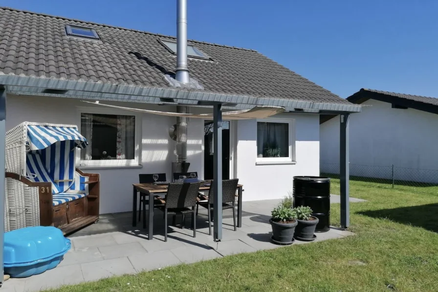 Außenansicht - Haus kaufen in Butjadingen - Renditestarke Ferien-Doppelhaushälfte in Eckwarderhörne! Attraktive Kapitalanlage an der Nordseeküste!