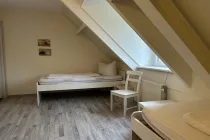 Schlafzimmer III OG