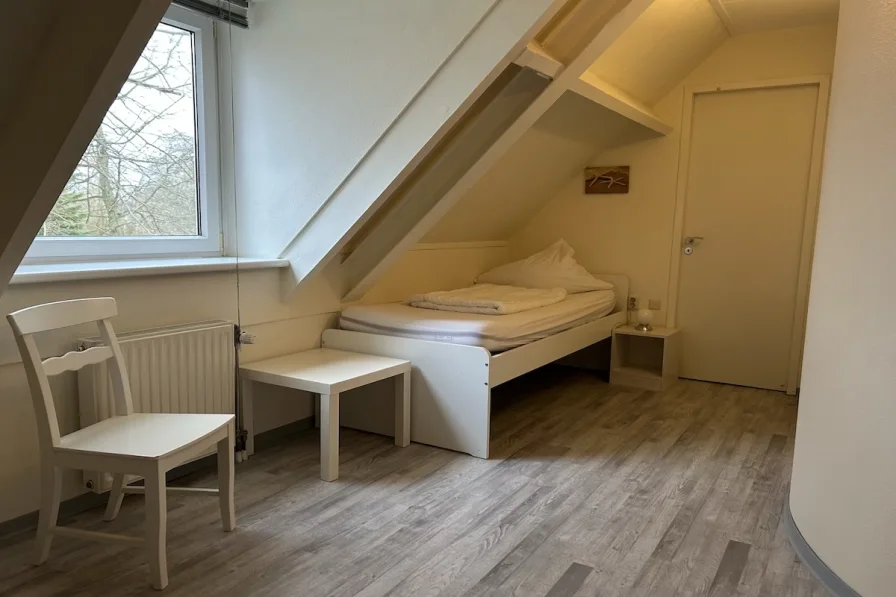 Schlafzimmer III OG