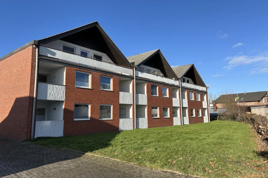 Hausansicht - Wohnung kaufen in Butjadingen - Stilvolle Wohnung an der Nordseeküste - Ihr Rückzugsort am Meer!