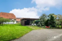 Conath-Immobilien_Harsefeld_Buxtehude_Fredenbeck - So könnte der Blick in den Garten mit Carport aussehen