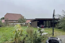 Conath-Immobilien_Harsefeld_Buxtehude_Fredenbeck - Blick in den Garten mit Carport