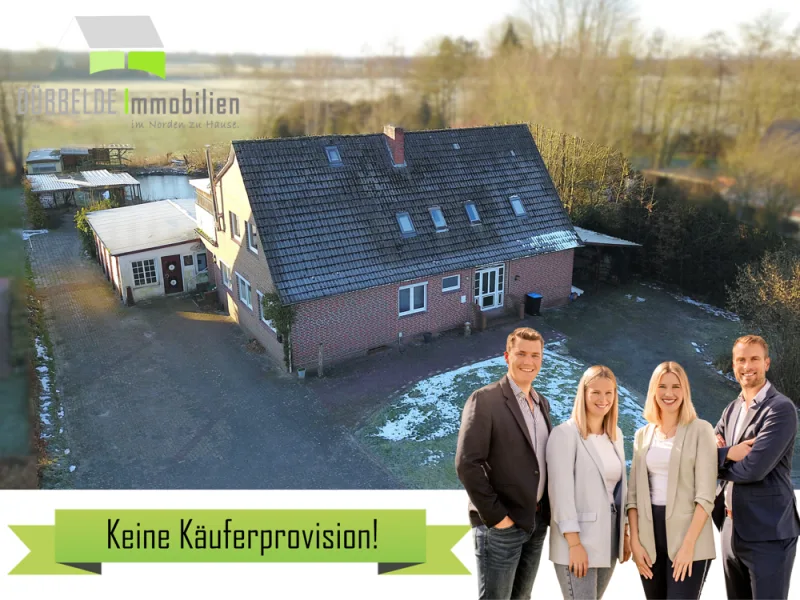 Außenansicht - Haus kaufen in Uplengen / Südgeorgsfehn - Immobilie mit Potential auf weitläufigem Grundstück in Südgeorgsfehn!