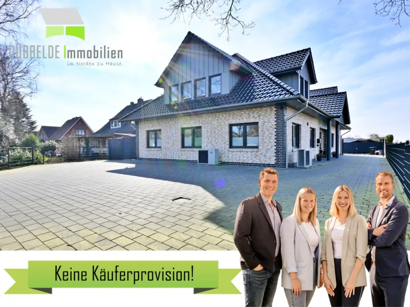 Außenansicht - Haus kaufen in Ostrhauderfehn / Idafehn - Neuwertiges 2-Familien-Haus auf top Energielevel! Wärmepumpe, PV & Speicher | 330 m²