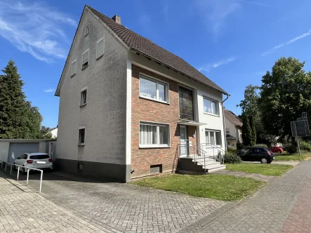  - Haus kaufen in Dissen am Teutoburger Wald - Zentrumsnahes Zweifamilienhaus mit Einliegerwohnung