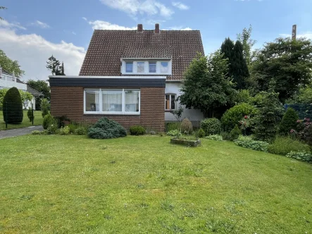  - Haus kaufen in Dissen am Teutoburger Wald - Praktisches Zweifamilienhaus am Ortseingang von Dissen