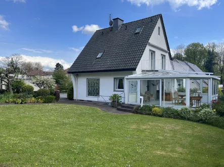 Rückansicht - Haus kaufen in Bad Rothenfelde - Gepflegtes Einfamilienhaus in attraktiver Kurortlage