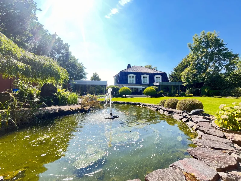 Gartenteich mit Wasserspiele