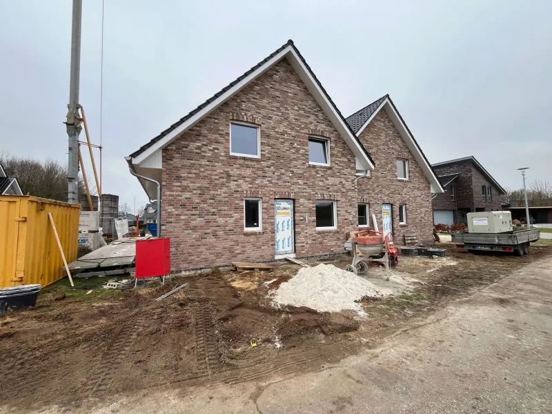 Hausansicht - Haus mieten in Renkenberge - Top Doppelhaushälfte zu vermieten! Neubau-Erstbezug