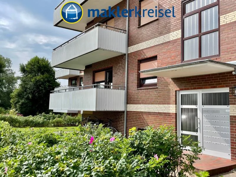 Außen - Wohnung kaufen in Dornum OT Dornumersiel - Gepflegte Eigentumswohnung mit großem Balkon an der Nordsee!