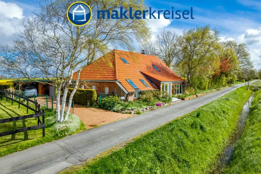 Außen - Haus kaufen in Wittmund OT Carolinensiel - Traumhafte Alleinlage an der Nordsee: Landhaus mit zwei Wohneinheiten!