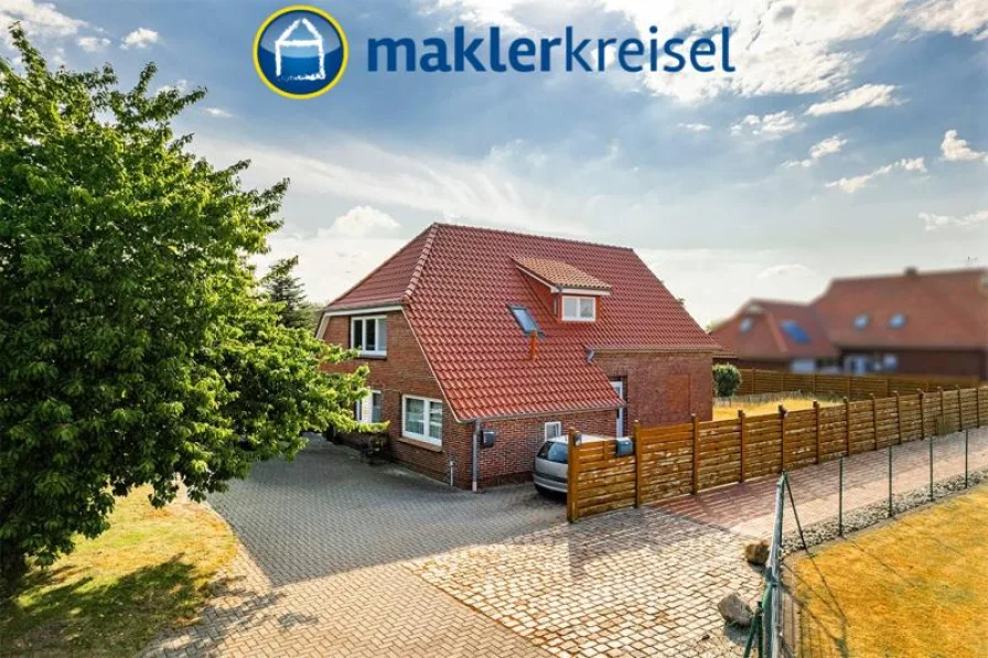 Außen - Haus kaufen in Friedeburg OT Etzel - Wohnhaus mit zwei Wohneinheiten und großem Grundstück in Etzel