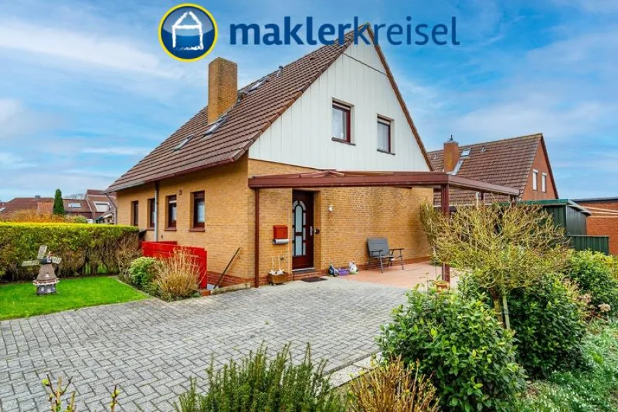 Außen - Haus kaufen in Wittmund OT Carolinensiel - Nordseeheilbad Carolinensiel: gepflegte Doppelhaushälfte mit Carport in Deichnähe