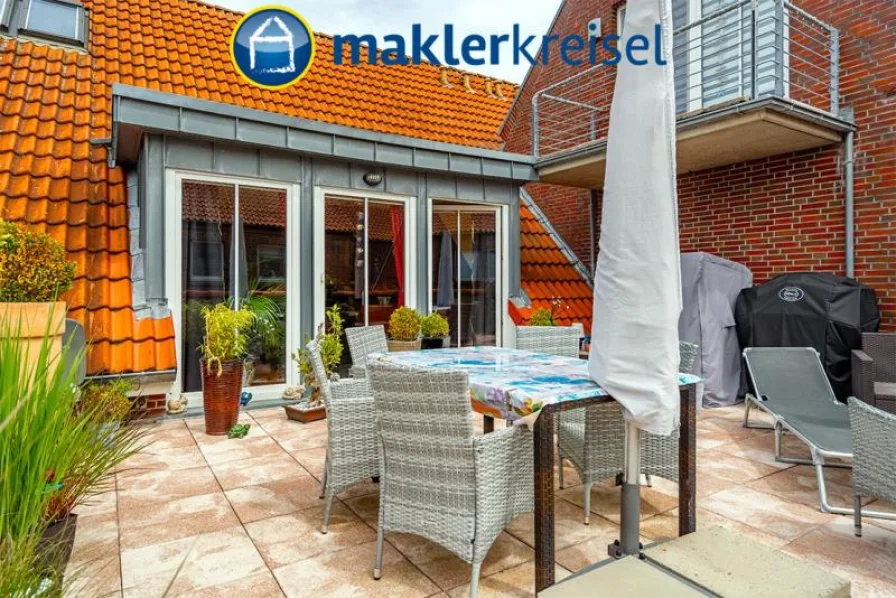 Dachterrasse - Wohnung kaufen in Carolinensiel - Nordseeheilbad Carolinensiel: Großzügige Eigentumswohnung mit Dachterrasse und Carport in Top-Lage