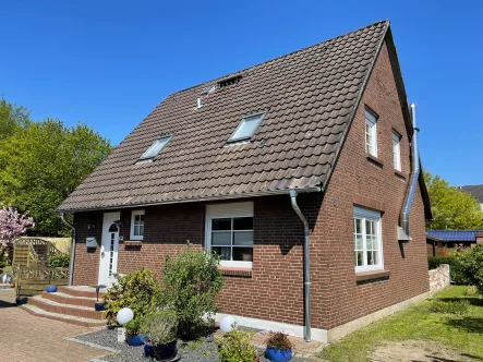 Titelbild - Haus kaufen in Flensburg - Charmantes Häuschen in ruhiger Sackgassenlage
