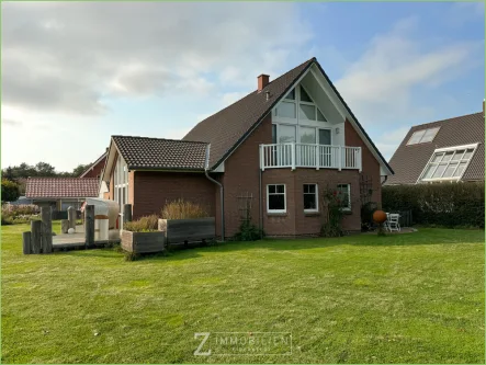 Garten mit Blick zum Balkon  - Wohnung mieten in St. Peter-Ording - Ruhiges Wohnen in Böhl**