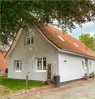 Hausansicht  - Haus kaufen in Stapel - Energieeffizienz trifft auf historischen Charme**