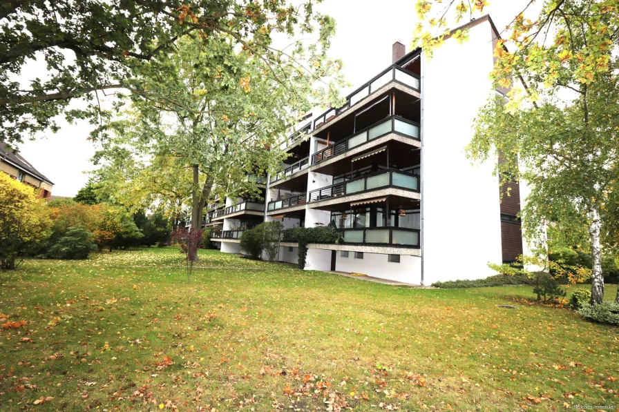 Gartenanlage - Wohnung kaufen in Gifhorn - Gepflegte 4-Zi.- Wohnung mit großem Westbalkon in ruhiger Wohnlage