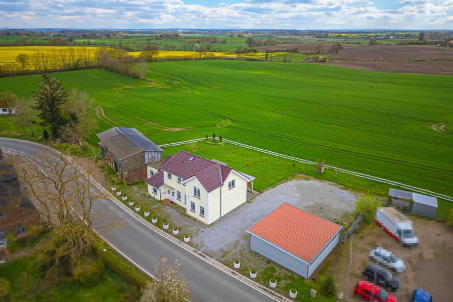 Grundstück Ansicht II - Haus kaufen in Stoltebüll - Mehrgenerationenwohnen mit Weitblick?Modernisiert, 205 qm Wohn- u. Nutzfl.,3 Carports, gr. Garten