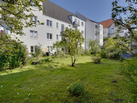 Hausansicht Balkonseite - Wohnung mieten in Flensburg - Gemütliche 3-Zimmer Wohnung mit Balkon in West-Ausrichtung, ab 01.07.2024 verfügbar!