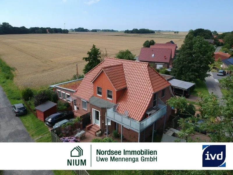 Bild1 - Haus kaufen in Hagermarsch - DEICHNAH AM FELDRAND. WOHNHAUS MIT 2 WOHNUNGEN IN SEHR RUHIGER LAGE.