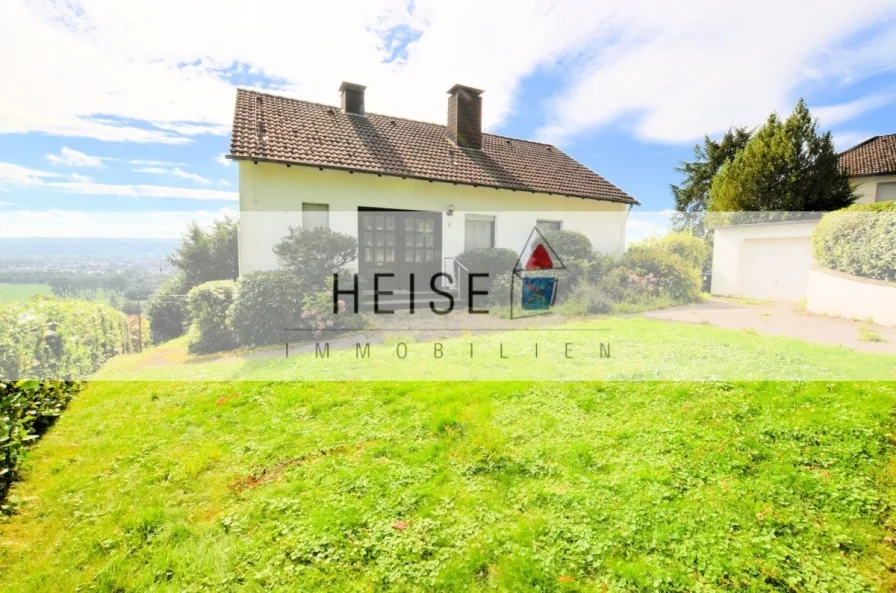 Heise Immobilien - Stahle - Unverbauter Fernblick - www.immobilien-heise.de - Haus kaufen in Höxter-Stahle - 1-Familienwohnhaus mit Garage mit unverbauter Fernsicht - Stahle Ortsrandlage